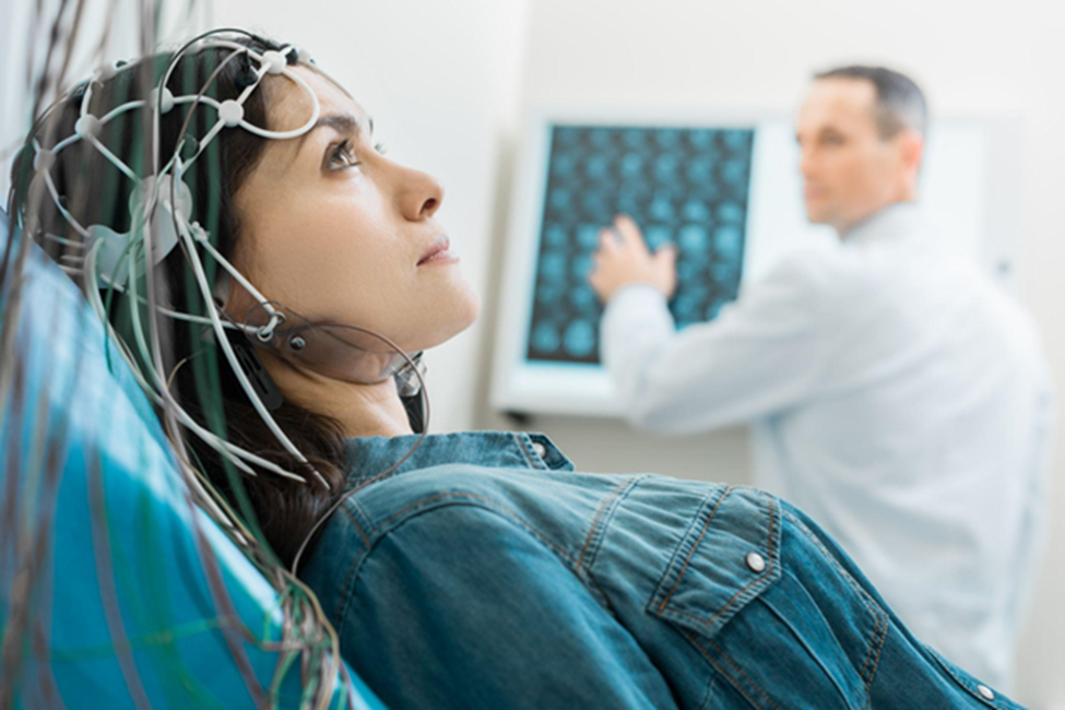 Charming Young Woman undergoing electroencep