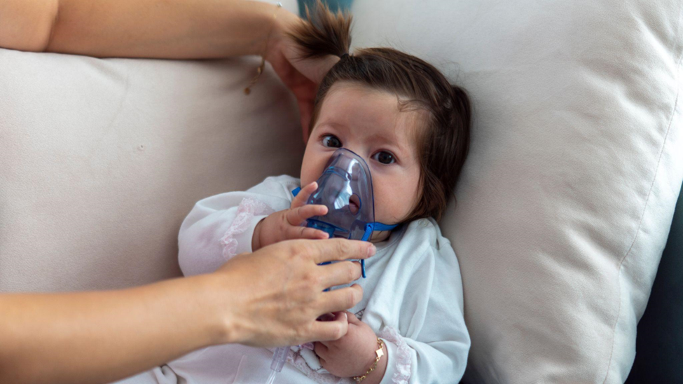 Nebulizer. cute baby treated with a nebulizer.