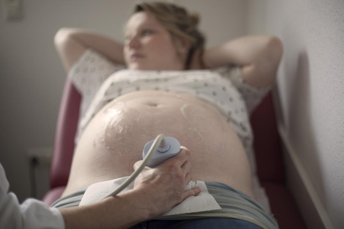 pregnant woman during ultrasound scanning