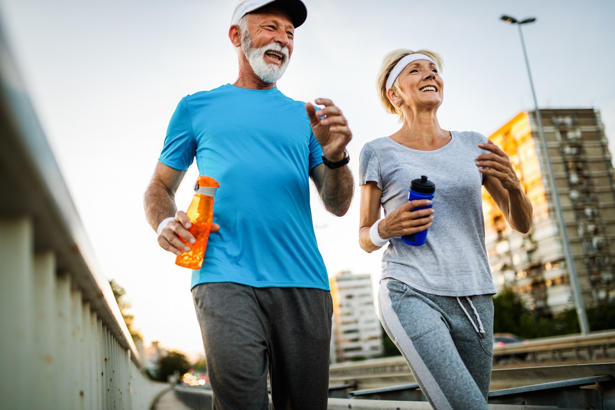 senior couple running