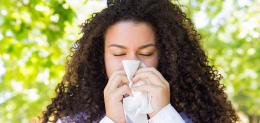 beautiful-woman-blowing-nose-park_LOWRES