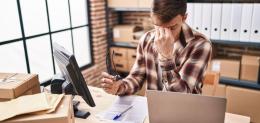 young-man-ecommerce-business-worker-stressed-working-at-office