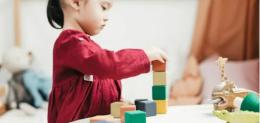 child playing with blocks
