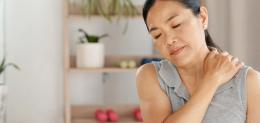 Woman experiences muscle soreness