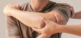 A patient has an injured limb examined following recovery from an injury