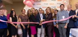 Image of people cutting a ribbon at radiology celebration