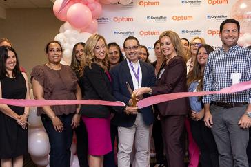 Image of people cutting a ribbon at radiology celebration