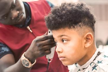 boy at barber shop