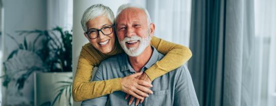 Smiling elderly couple