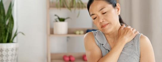 Woman experiences muscle soreness