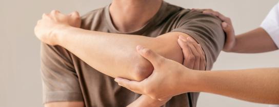 A patient has an injured limb examined following recovery from an injury