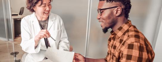 A patient speaks with their provider