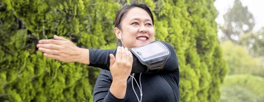 woman stretching outdoors