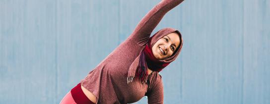 woman stretching arm