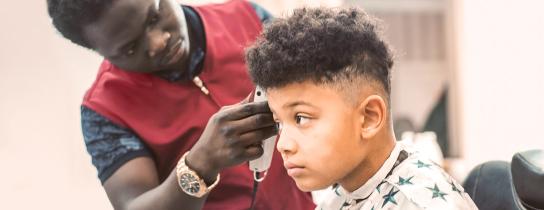 boy at barber shop