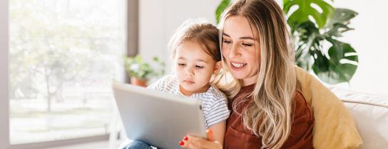 Mom and child on tablet