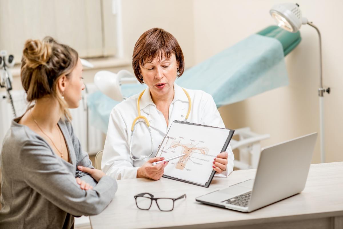 Young woman patient with a senior gynecologist during the consultation